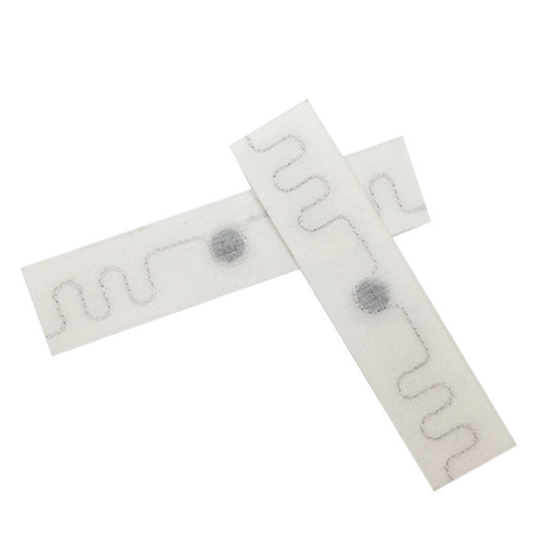 Etiqueta impermeable de alta temperatura del lavadero de Monza R6 UHF RFID de la materia textil de la tela