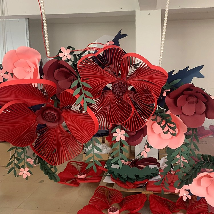 Exhibición de accesorios de flores de arte de papel de ventana de Navidad