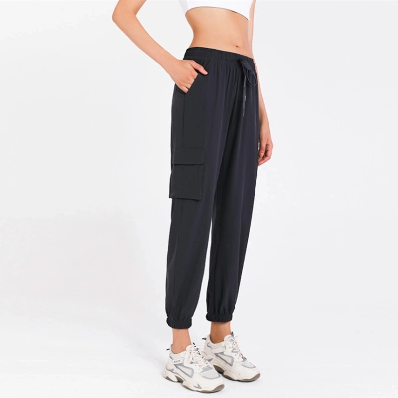 Pantalones de yoga de secado rápido elásticos de cuatro maneras, pantalones de chándal de fitness para mujer