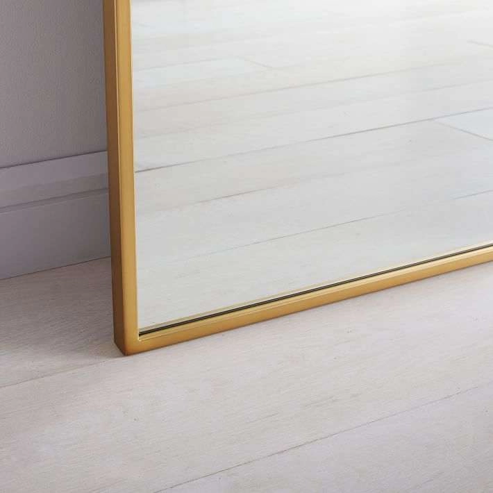 Espejos de piso arqueados de metal dorado