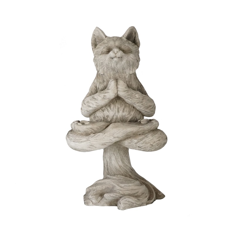 estatua de gato meditando