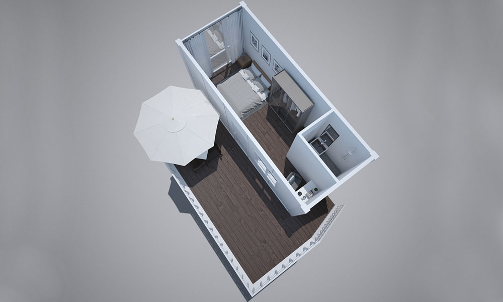 casa contenedor con escalera y balcón
